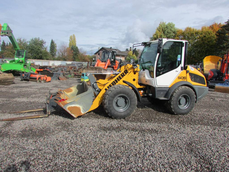Liebherr L 506 Compact Radlader 46.500 EUR netto L506C - Utovarivač na kotačima: slika Liebherr L 506 Compact Radlader 46.500 EUR netto L506C - Utovarivač na kotačima Liebherr L 506 Compact Radlader 46.500 EUR netto L506C - Utovarivač na kotačima: slika Liebherr L 506 Compact Radlader 46.500 EUR netto L506C - Utovarivač na kotačima