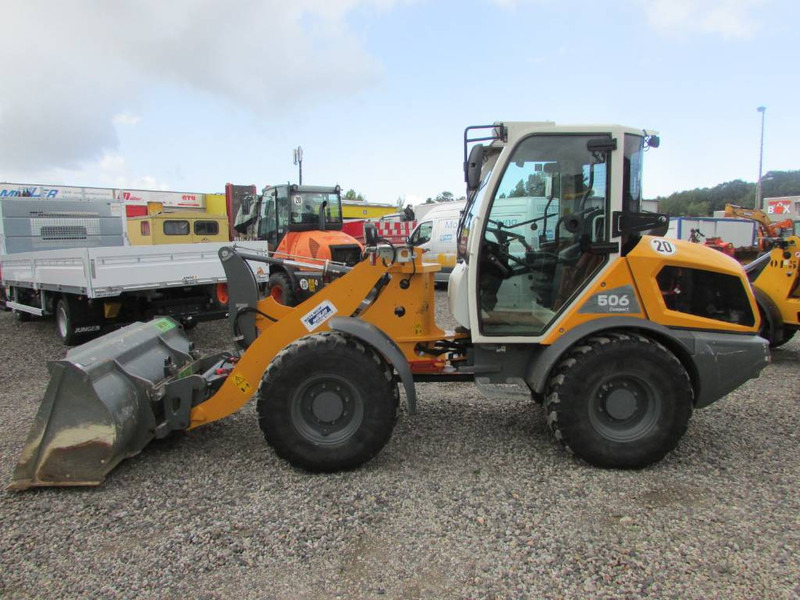 Liebherr L 506 Compact Radlader L506 41.500 EUR - Utovarivač na kotačima: slika Liebherr L 506 Compact Radlader L506 41.500 EUR - Utovarivač na kotačima Liebherr L 506 Compact Radlader L506 41.500 EUR - Utovarivač na kotačima: slika Liebherr L 506 Compact Radlader L506 41.500 EUR - Utovarivač na kotačima