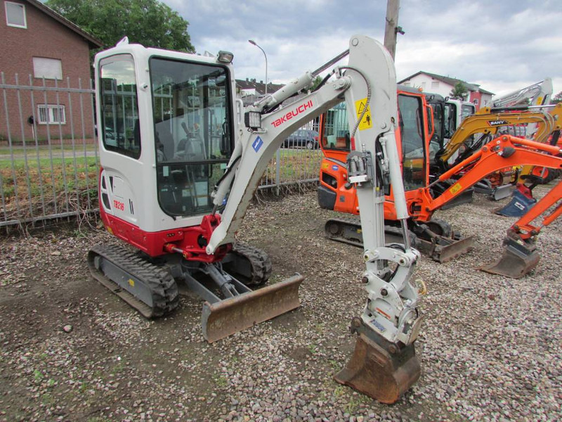 Takeuchi TB 216 V4 Minibagger 24.500 EUR - Mini bager: slika Takeuchi TB 216 V4 Minibagger 24.500 EUR - Mini bager Takeuchi TB 216 V4 Minibagger 24.500 EUR - Mini bager: slika Takeuchi TB 216 V4 Minibagger 24.500 EUR - Mini bager