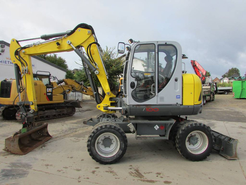 WACKER NEUSON EW 100 Mobilbagger Klima / AC / 59.500 EUR - Bager na kotačima: slika WACKER NEUSON EW 100 Mobilbagger Klima / AC / 59.500 EUR - Bager na kotačima WACKER NEUSON EW 100 Mobilbagger Klima / AC / 59.500 EUR - Bager na kotačima: slika WACKER NEUSON EW 100 Mobilbagger Klima / AC / 59.500 EUR - Bager na kotačima