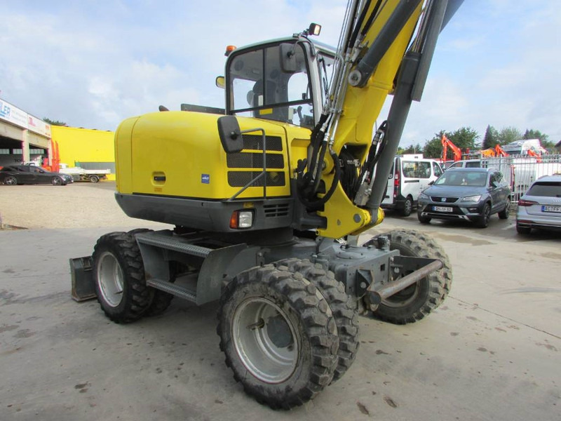 WACKER NEUSON EW 100 Mobilbagger Klima / AC / 59.500 EUR - Bager na kotačima: slika WACKER NEUSON EW 100 Mobilbagger Klima / AC / 59.500 EUR - Bager na kotačima WACKER NEUSON EW 100 Mobilbagger Klima / AC / 59.500 EUR - Bager na kotačima: slika WACKER NEUSON EW 100 Mobilbagger Klima / AC / 59.500 EUR - Bager na kotačima