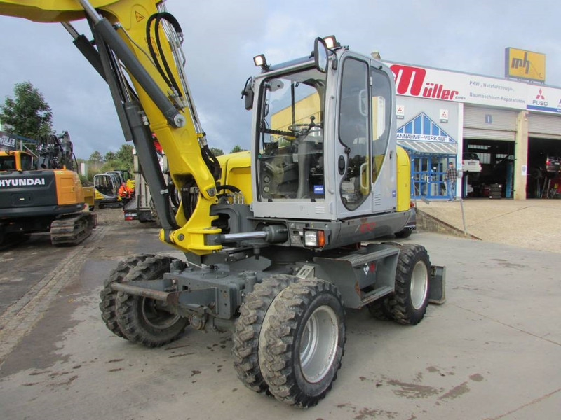 WACKER NEUSON EW 100 Mobilbagger Klima / AC / 59.500 EUR - Bager na kotačima: slika WACKER NEUSON EW 100 Mobilbagger Klima / AC / 59.500 EUR - Bager na kotačima WACKER NEUSON EW 100 Mobilbagger Klima / AC / 59.500 EUR - Bager na kotačima: slika WACKER NEUSON EW 100 Mobilbagger Klima / AC / 59.500 EUR - Bager na kotačima