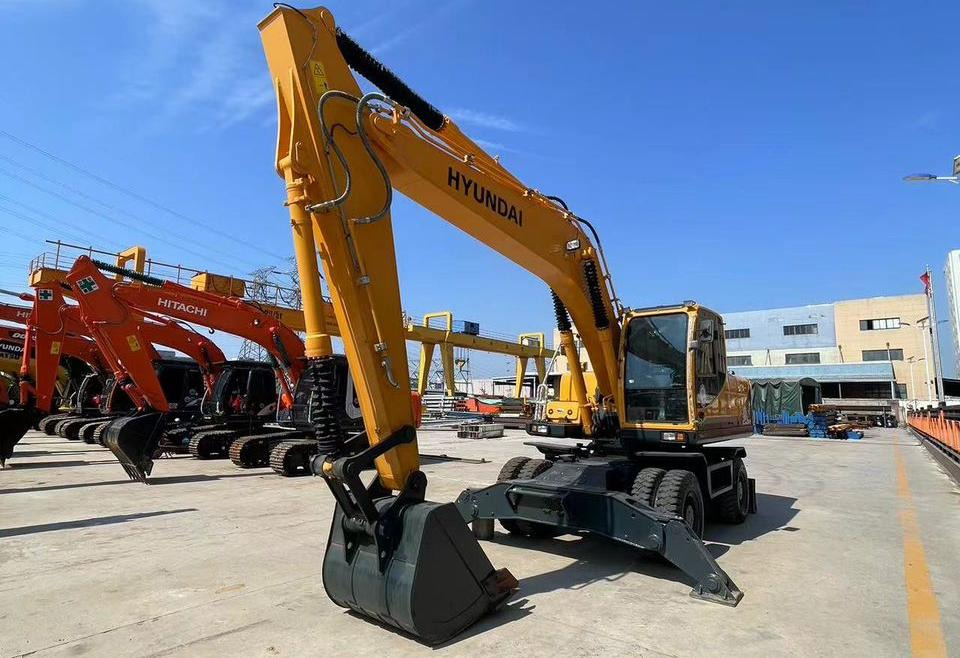 Hyundai 210W-9 - Bager na kotačima: slika Hyundai 210W-9 - Bager na kotačima Hyundai 210W-9 - Bager na kotačima: slika Hyundai 210W-9 - Bager na kotačima