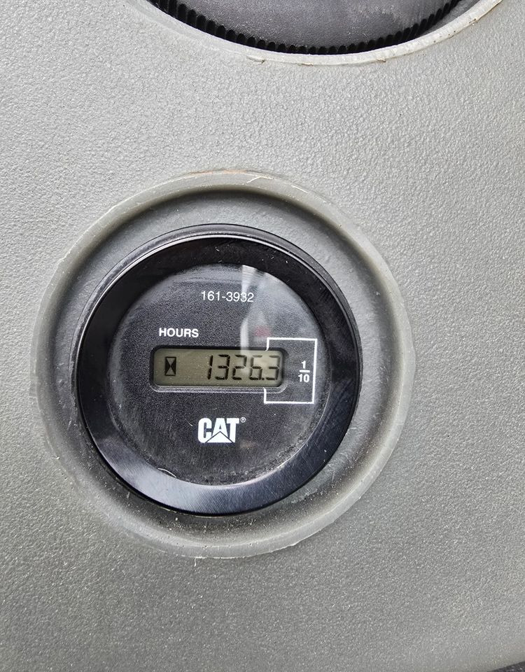 Caterpillar - Rovokopač-utovarivač: slika Caterpillar - Rovokopač-utovarivač Caterpillar - Rovokopač-utovarivač: slika Caterpillar - Rovokopač-utovarivač