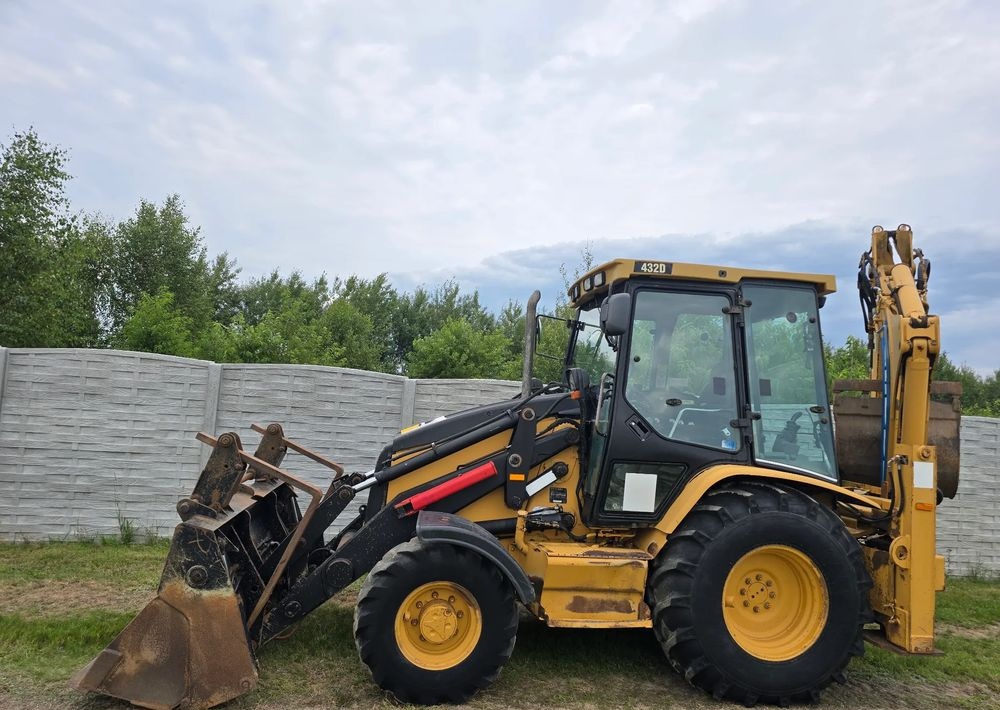 Caterpillar - Rovokopač-utovarivač: slika Caterpillar - Rovokopač-utovarivač Caterpillar - Rovokopač-utovarivač: slika Caterpillar - Rovokopač-utovarivač