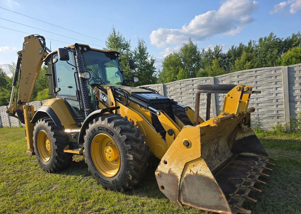 Caterpillar - Rovokopač-utovarivač: slika  Caterpillar - Rovokopač-utovarivač Caterpillar - Rovokopač-utovarivač: slika  Caterpillar - Rovokopač-utovarivač