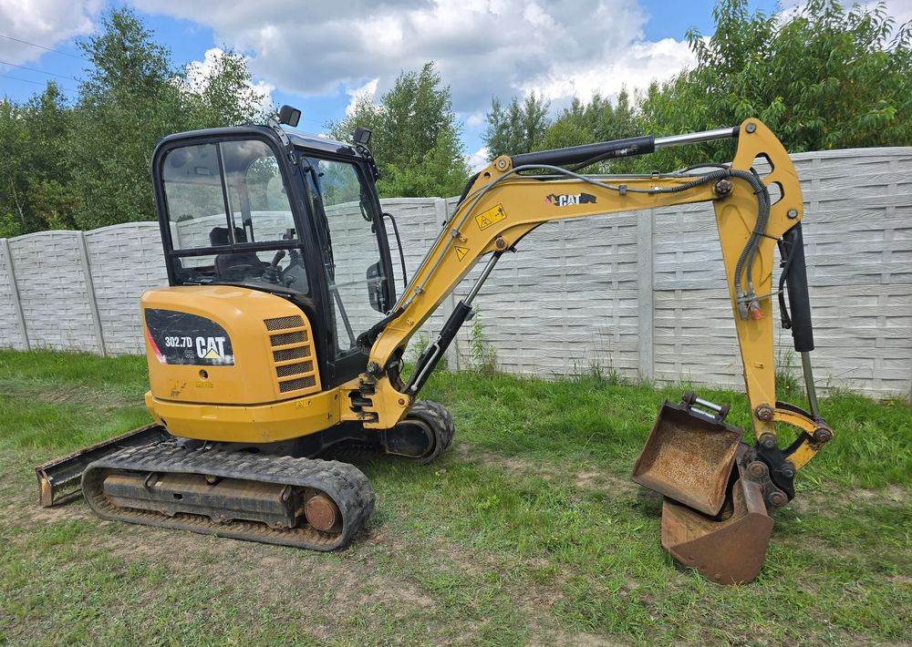 Caterpillar - Mini bager: slika Caterpillar - Mini bager Caterpillar - Mini bager: slika Caterpillar - Mini bager