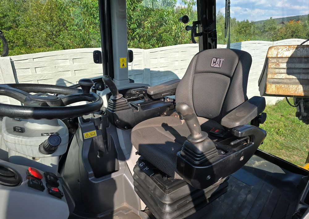 Caterpillar - Rovokopač-utovarivač: slika Caterpillar - Rovokopač-utovarivač Caterpillar - Rovokopač-utovarivač: slika Caterpillar - Rovokopač-utovarivač