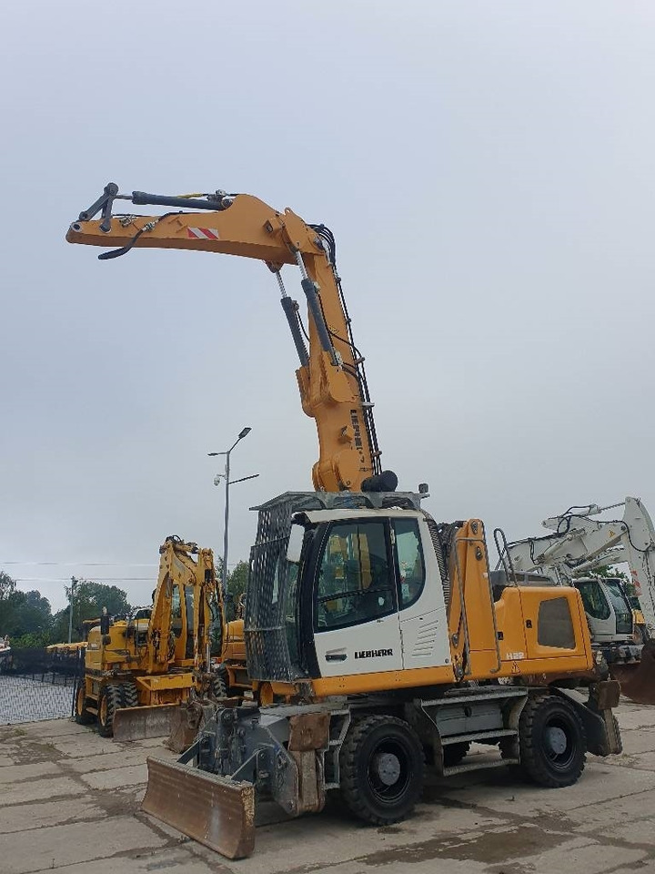 Liebherr LH 22 M - Stroj za rukovanje otpadom: slika Liebherr LH 22 M - Stroj za rukovanje otpadom Liebherr LH 22 M - Stroj za rukovanje otpadom: slika Liebherr LH 22 M - Stroj za rukovanje otpadom