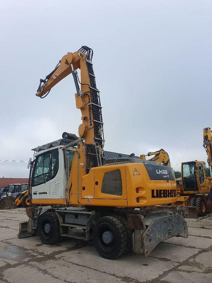 Liebherr LH 22 M - Stroj za rukovanje otpadom: slika Liebherr LH 22 M - Stroj za rukovanje otpadom Liebherr LH 22 M - Stroj za rukovanje otpadom: slika Liebherr LH 22 M - Stroj za rukovanje otpadom