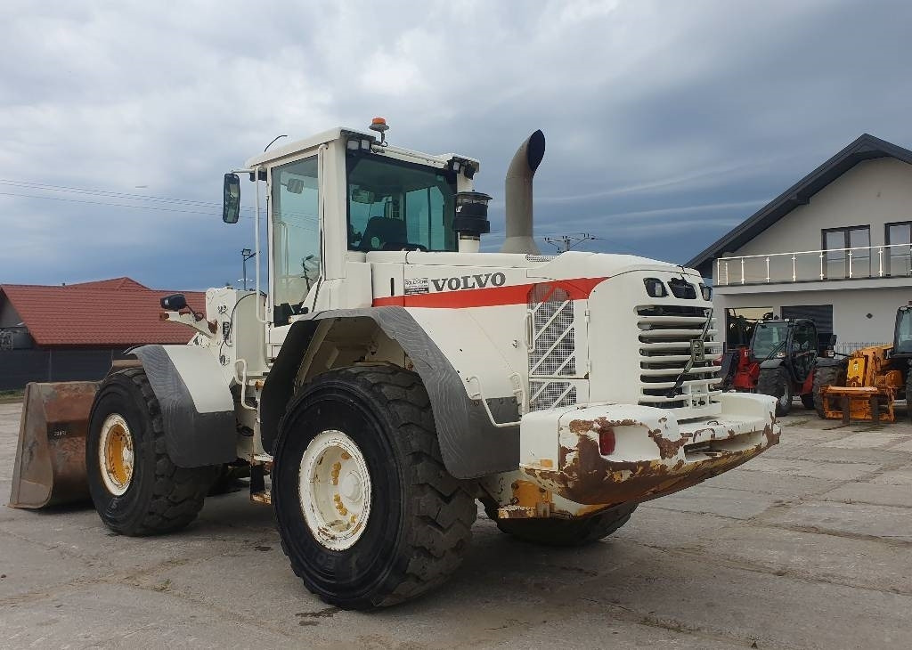 Volvo L 110 F - Utovarivač na kotačima: slika Volvo L 110 F - Utovarivač na kotačima Volvo L 110 F - Utovarivač na kotačima: slika Volvo L 110 F - Utovarivač na kotačima