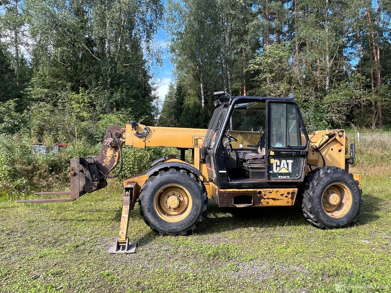 Caterpillar TH63, kurottaja piikeillä ja kauhalla, 2002, Loppi - Poljoprivredni strojevi: slika Caterpillar TH63, kurottaja piikeillä ja kauhalla, 2002, Loppi - Poljoprivredni strojevi Caterpillar TH63, kurottaja piikeillä ja kauhalla, 2002, Loppi - Poljoprivredni strojevi: slika Caterpillar TH63, kurottaja piikeillä ja kauhalla, 2002, Loppi - Poljoprivredni strojevi