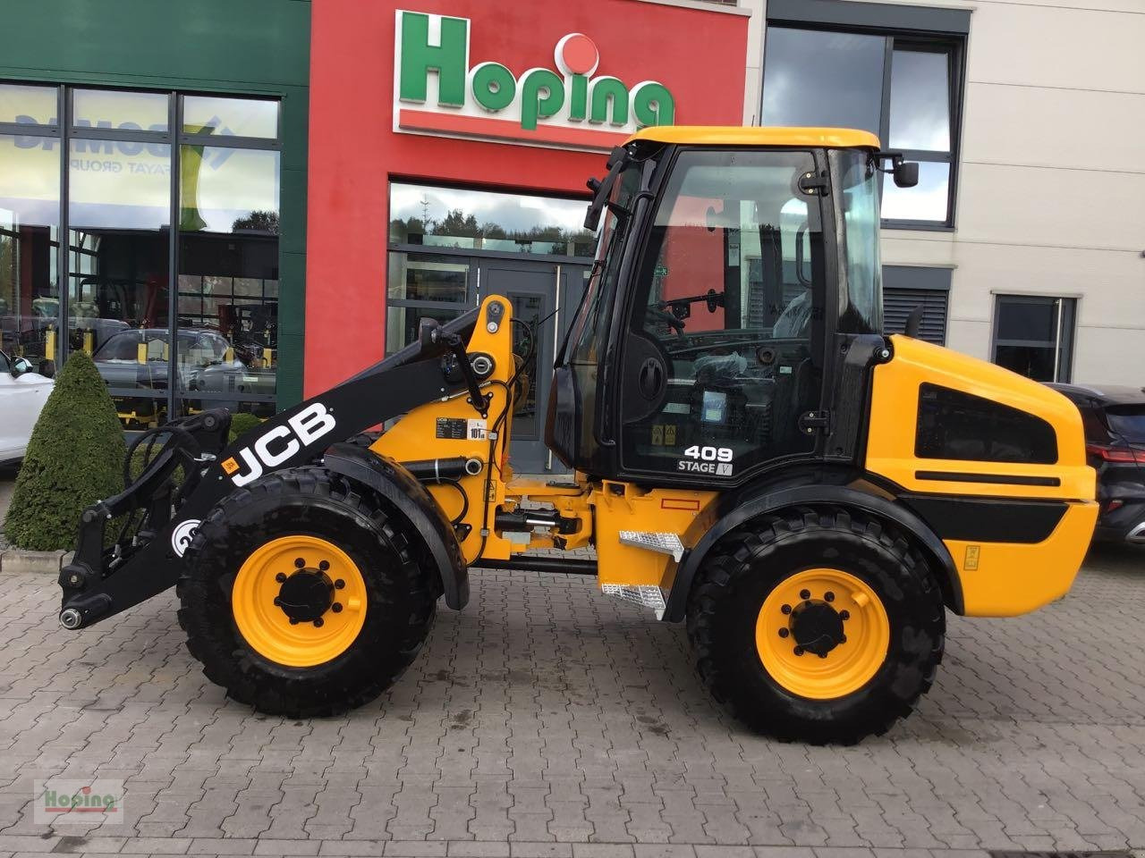 JCB 409 - Utovarivač na kotačima: slika JCB 409 - Utovarivač na kotačima JCB 409 - Utovarivač na kotačima: slika JCB 409 - Utovarivač na kotačima