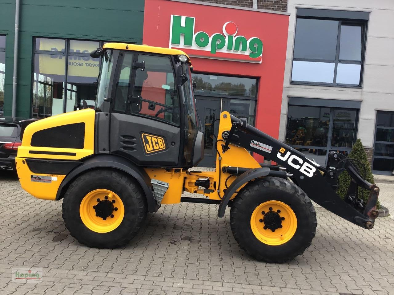 JCB 409 - Utovarivač na kotačima: slika JCB 409 - Utovarivač na kotačima JCB 409 - Utovarivač na kotačima: slika JCB 409 - Utovarivač na kotačima