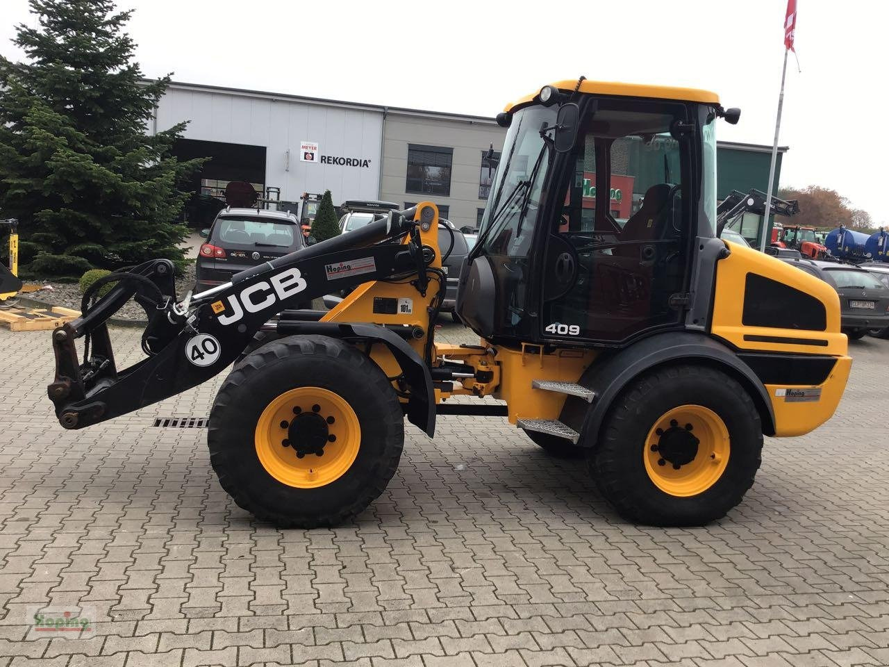 JCB 409 - Utovarivač na kotačima: slika JCB 409 - Utovarivač na kotačima JCB 409 - Utovarivač na kotačima: slika JCB 409 - Utovarivač na kotačima