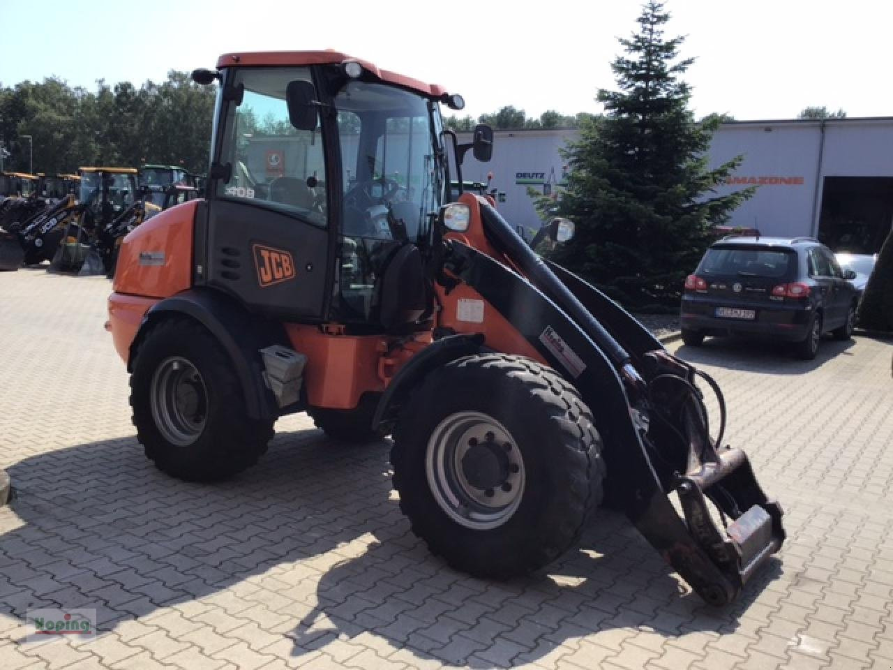 JCB 409 - Utovarivač na kotačima: slika JCB 409 - Utovarivač na kotačima JCB 409 - Utovarivač na kotačima: slika JCB 409 - Utovarivač na kotačima