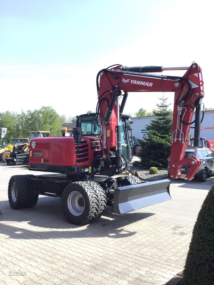 Yanmar B110W - Bager na kotačima: slika Yanmar B110W - Bager na kotačima Yanmar B110W - Bager na kotačima: slika Yanmar B110W - Bager na kotačima
