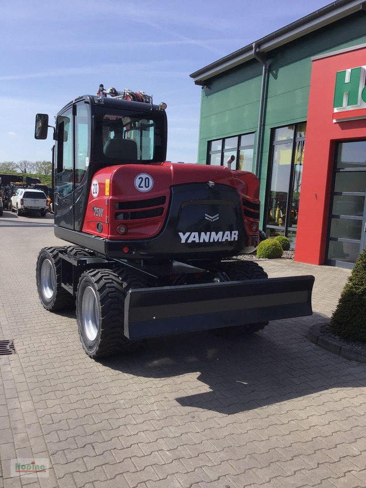 Yanmar B75W - Bager na kotačima: slika Yanmar B75W - Bager na kotačima Yanmar B75W - Bager na kotačima: slika Yanmar B75W - Bager na kotačima
