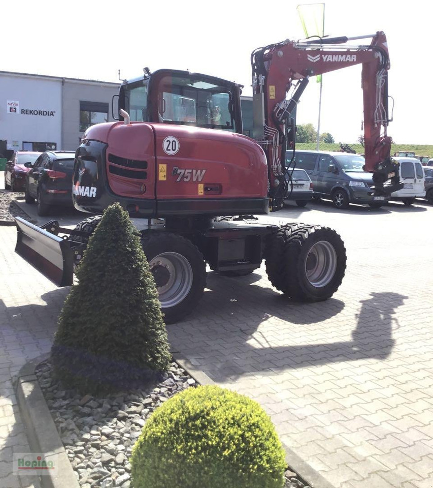 Yanmar B75W - Bager na kotačima: slika Yanmar B75W - Bager na kotačima Yanmar B75W - Bager na kotačima: slika Yanmar B75W - Bager na kotačima
