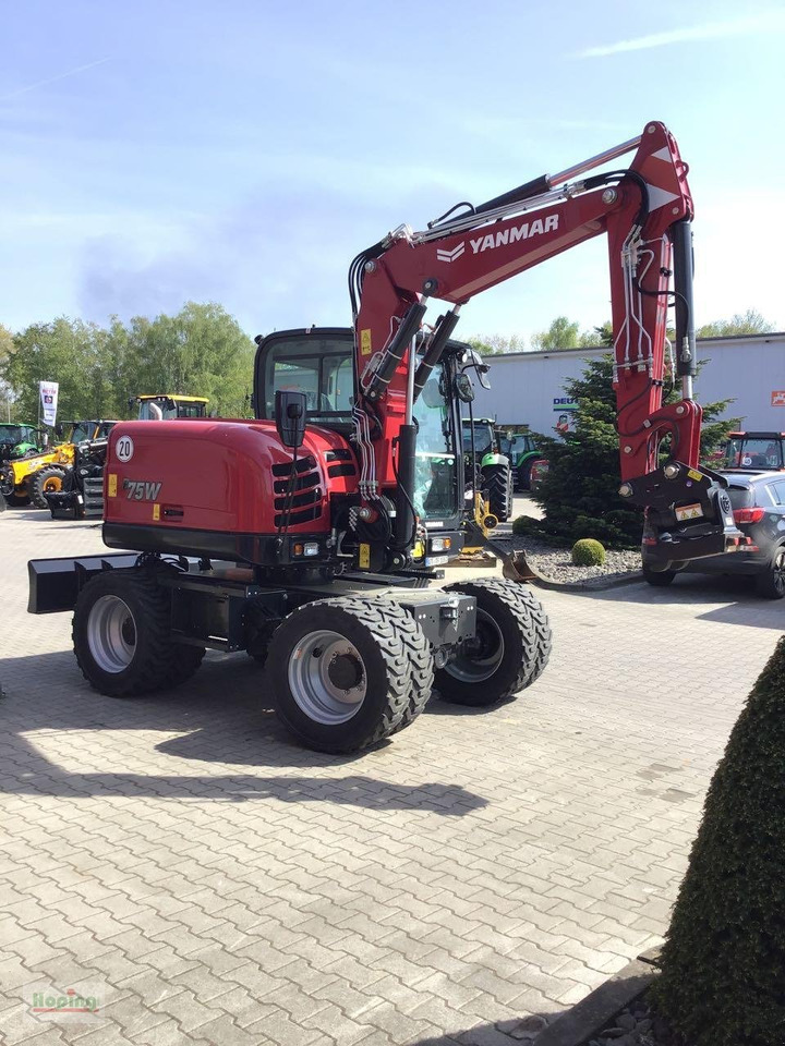 Yanmar B75W - Bager na kotačima: slika Yanmar B75W - Bager na kotačima Yanmar B75W - Bager na kotačima: slika Yanmar B75W - Bager na kotačima