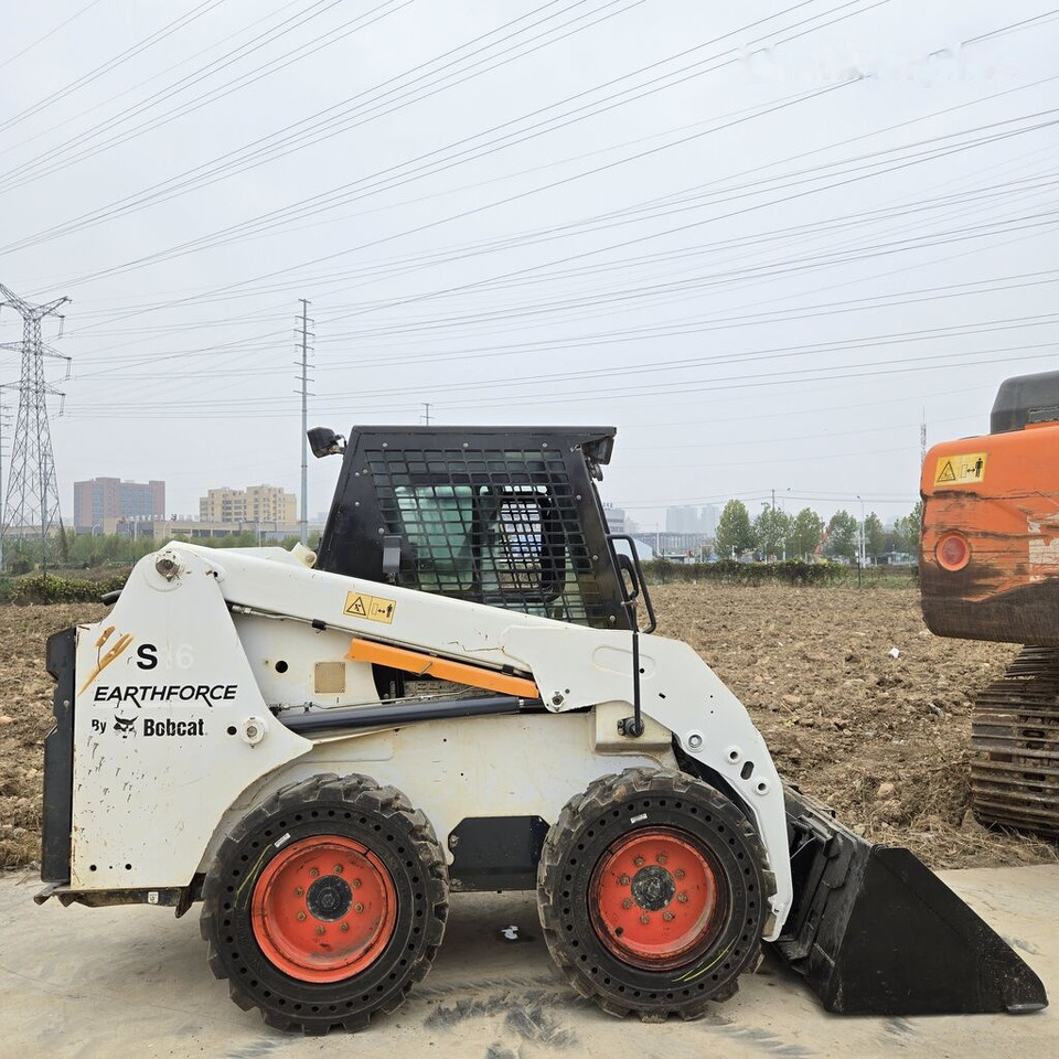 Bobcat S16 - Mini utovarivač: slika Bobcat S16 - Mini utovarivač Bobcat S16 - Mini utovarivač: slika Bobcat S16 - Mini utovarivač