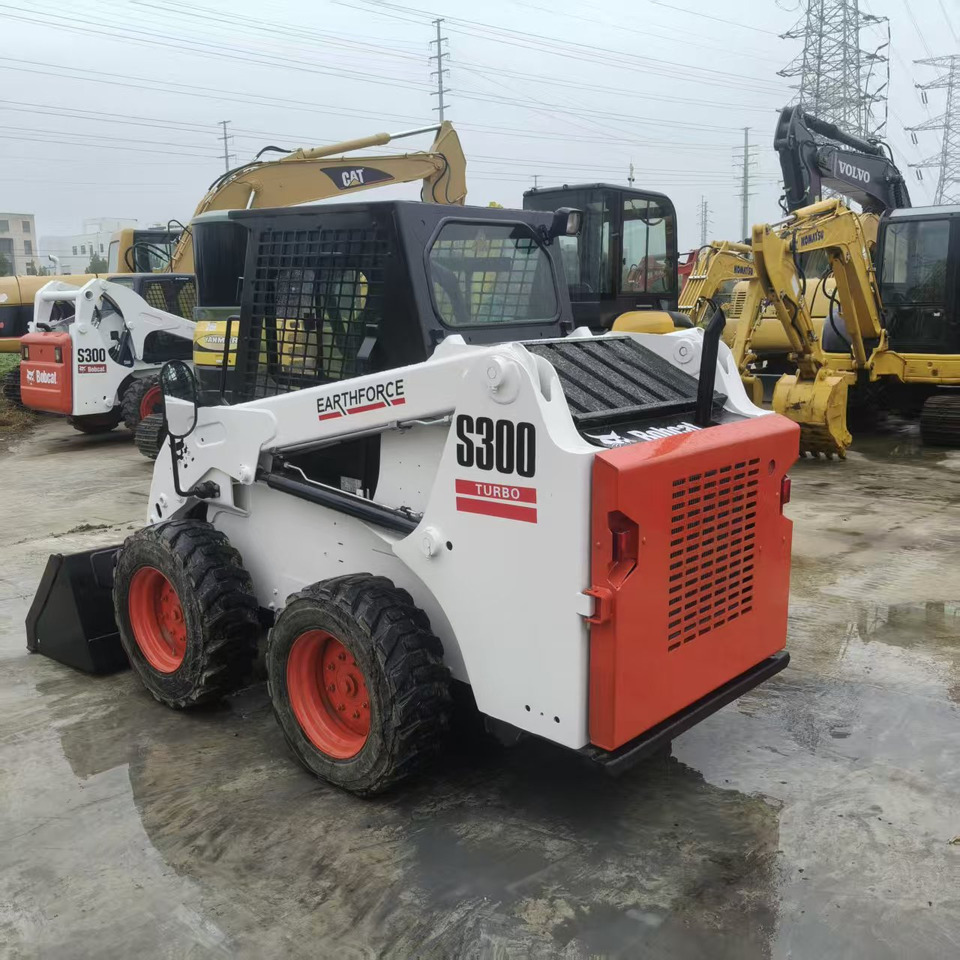 Bobcat S300 - Mini utovarivač: slika Bobcat S300 - Mini utovarivač Bobcat S300 - Mini utovarivač: slika Bobcat S300 - Mini utovarivač