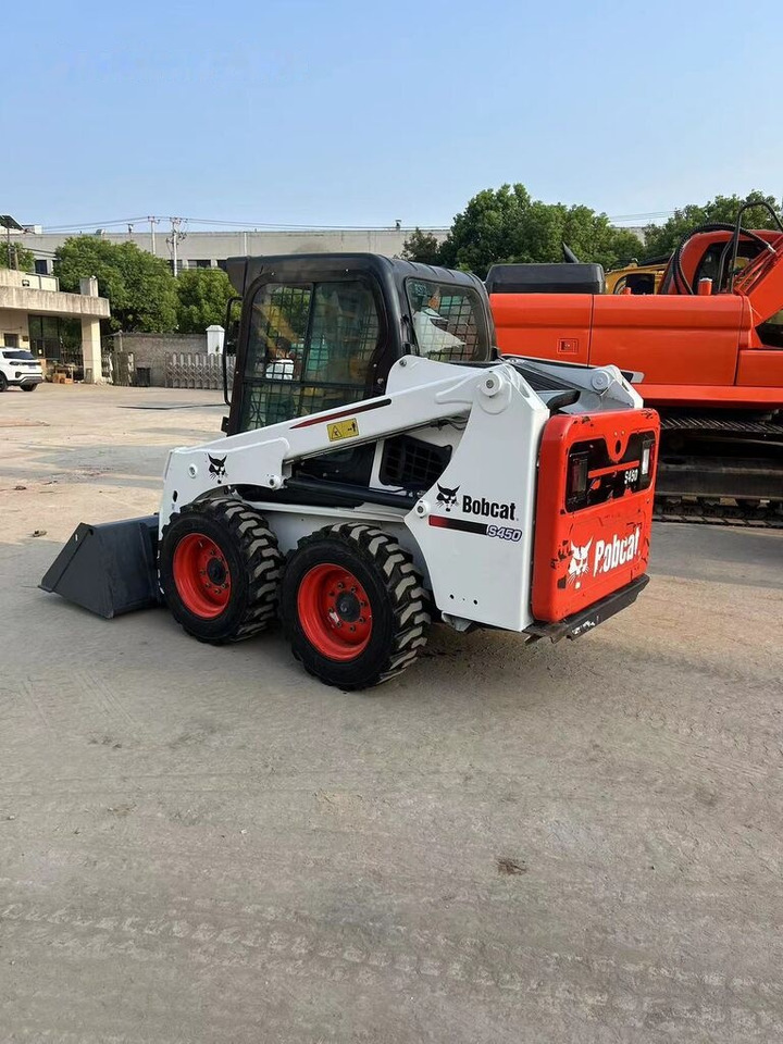 Bobcat S450 - Mini utovarivač: slika Bobcat S450 - Mini utovarivač Bobcat S450 - Mini utovarivač: slika Bobcat S450 - Mini utovarivač