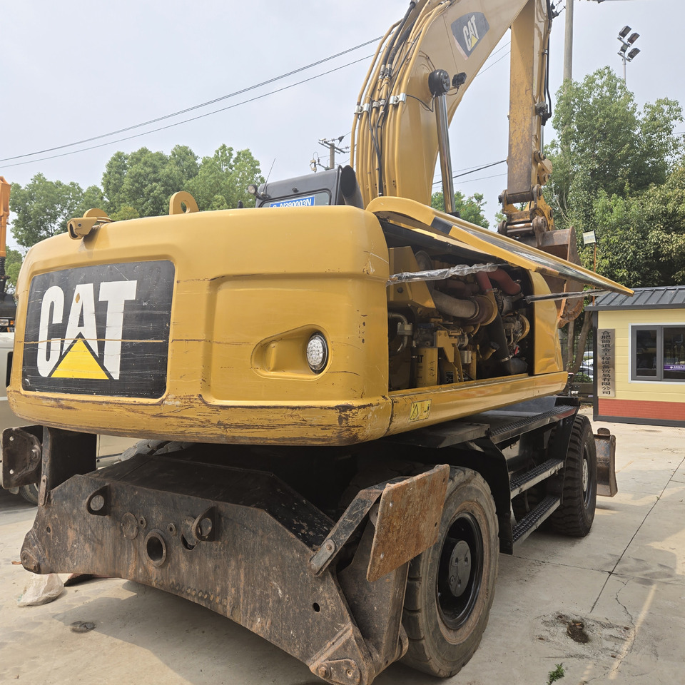 CAT M320D2 - Bager na kotačima: slika CAT M320D2 - Bager na kotačima CAT M320D2 - Bager na kotačima: slika CAT M320D2 - Bager na kotačima