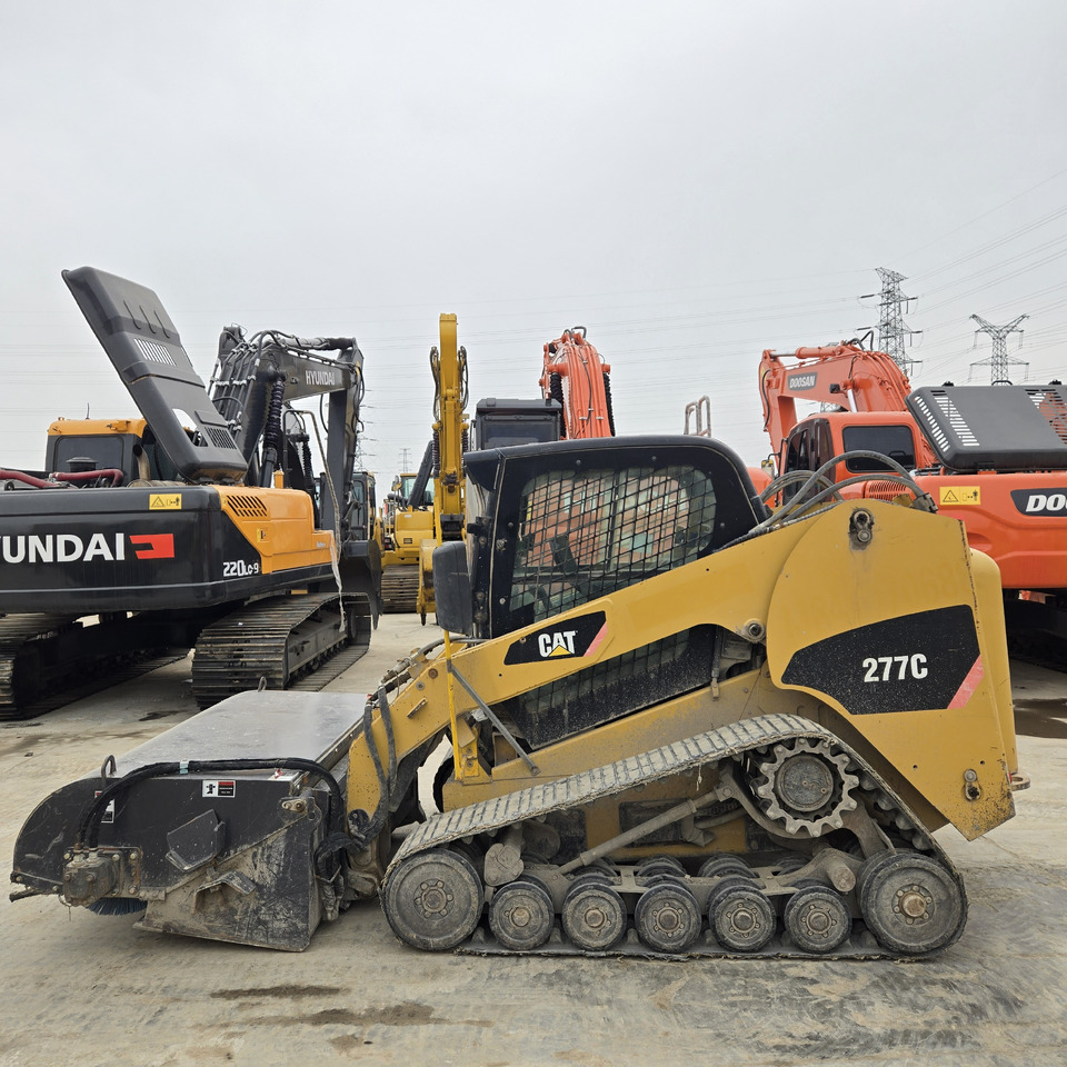 CATERPILLAR 277C - Mini utovarivač: slika CATERPILLAR 277C - Mini utovarivač CATERPILLAR 277C - Mini utovarivač: slika CATERPILLAR 277C - Mini utovarivač