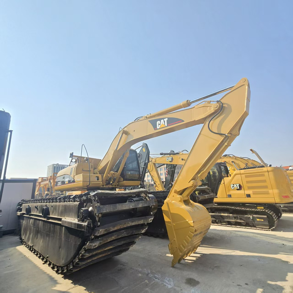 CATERPILLAR 320DL - Bager amfibija: slika CATERPILLAR 320DL - Bager amfibija CATERPILLAR 320DL - Bager amfibija: slika CATERPILLAR 320DL - Bager amfibija