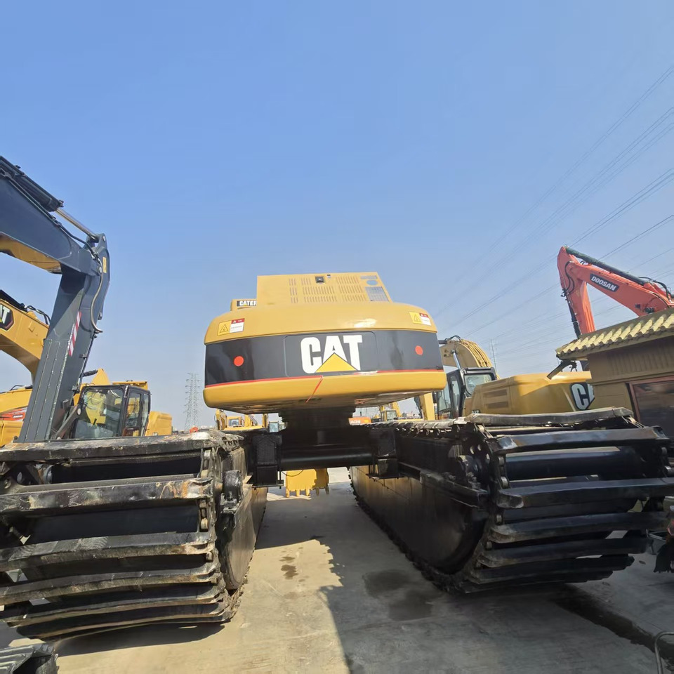 CATERPILLAR 320DL - Bager amfibija: slika CATERPILLAR 320DL - Bager amfibija CATERPILLAR 320DL - Bager amfibija: slika CATERPILLAR 320DL - Bager amfibija