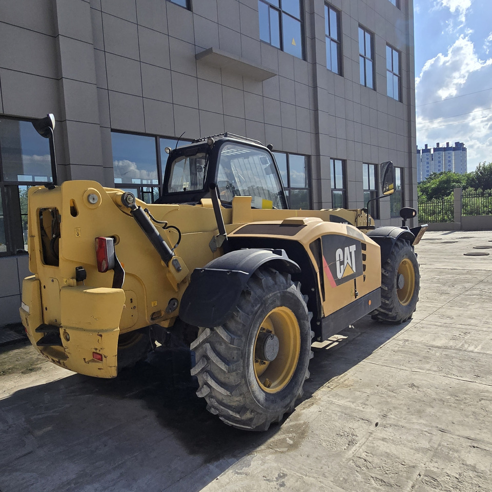 CATERPILLAR TH414 - Teleskopski krak: slika CATERPILLAR TH414 - Teleskopski krak CATERPILLAR TH414 - Teleskopski krak: slika CATERPILLAR TH414 - Teleskopski krak