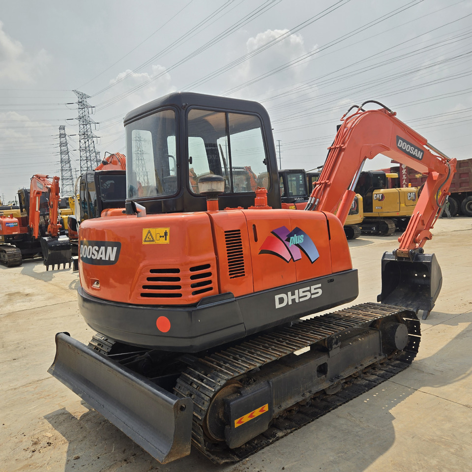 DOOSAN DH55 - Mini bager: slika DOOSAN DH55 - Mini bager DOOSAN DH55 - Mini bager: slika DOOSAN DH55 - Mini bager