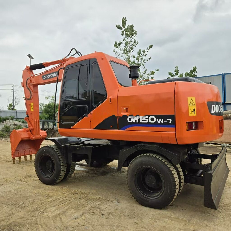 Doosan DH150W - Bager na kotačima: slika Doosan DH150W - Bager na kotačima Doosan DH150W - Bager na kotačima: slika Doosan DH150W - Bager na kotačima