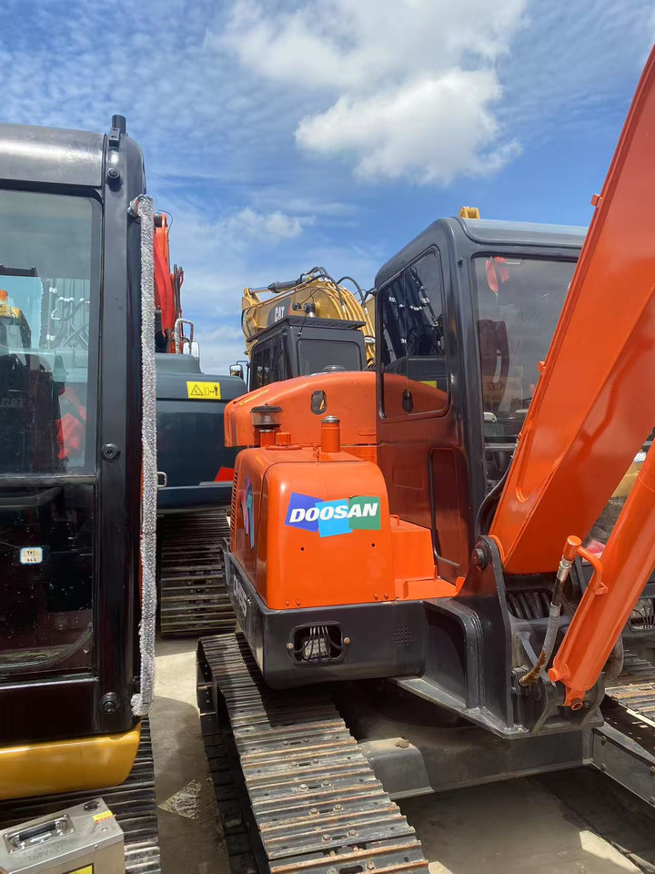 Doosan DH55 - Mini bager: slika Doosan DH55 - Mini bager Doosan DH55 - Mini bager: slika Doosan DH55 - Mini bager