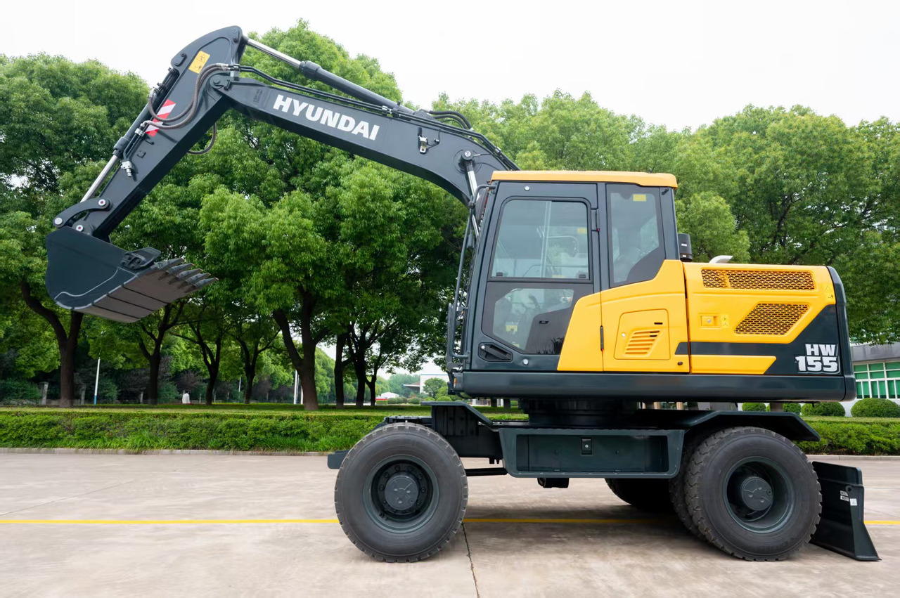 HYUNDAI HW155 - Bager na kotačima: slika HYUNDAI HW155 - Bager na kotačima HYUNDAI HW155 - Bager na kotačima: slika HYUNDAI HW155 - Bager na kotačima