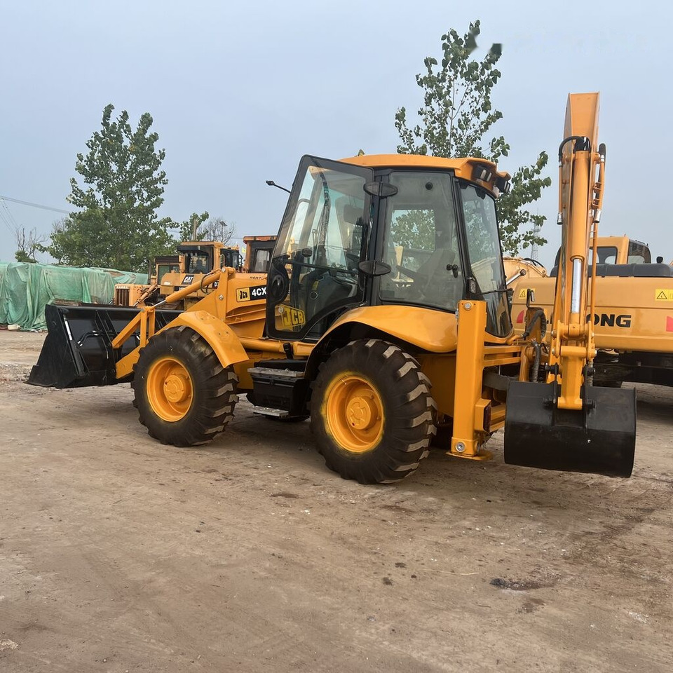JCB 4CX - Rovokopač-utovarivač: slika JCB 4CX - Rovokopač-utovarivač JCB 4CX - Rovokopač-utovarivač: slika JCB 4CX - Rovokopač-utovarivač