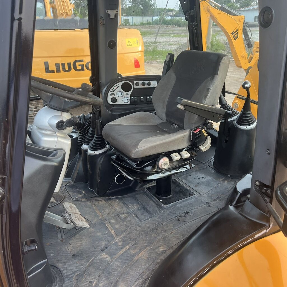 JCB 4CX - Rovokopač-utovarivač: slika JCB 4CX - Rovokopač-utovarivač JCB 4CX - Rovokopač-utovarivač: slika JCB 4CX - Rovokopač-utovarivač