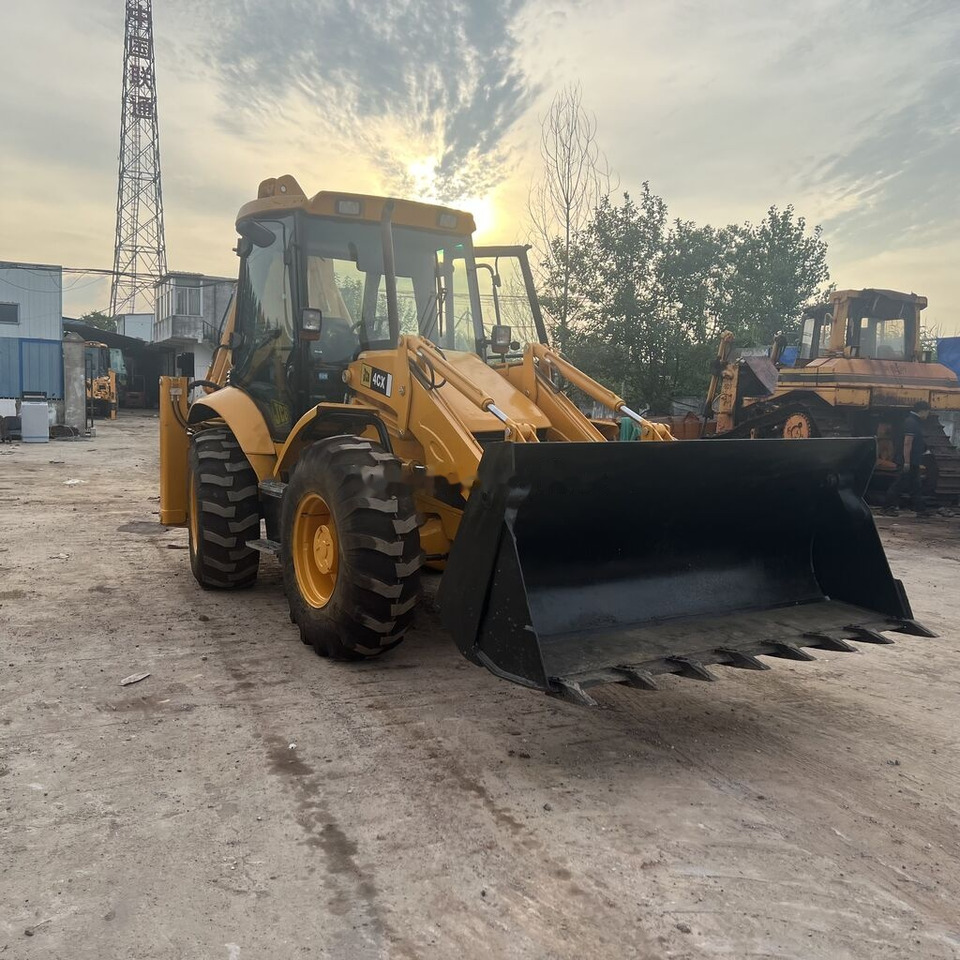 JCB 4CX - Rovokopač-utovarivač: slika JCB 4CX - Rovokopač-utovarivač JCB 4CX - Rovokopač-utovarivač: slika JCB 4CX - Rovokopač-utovarivač