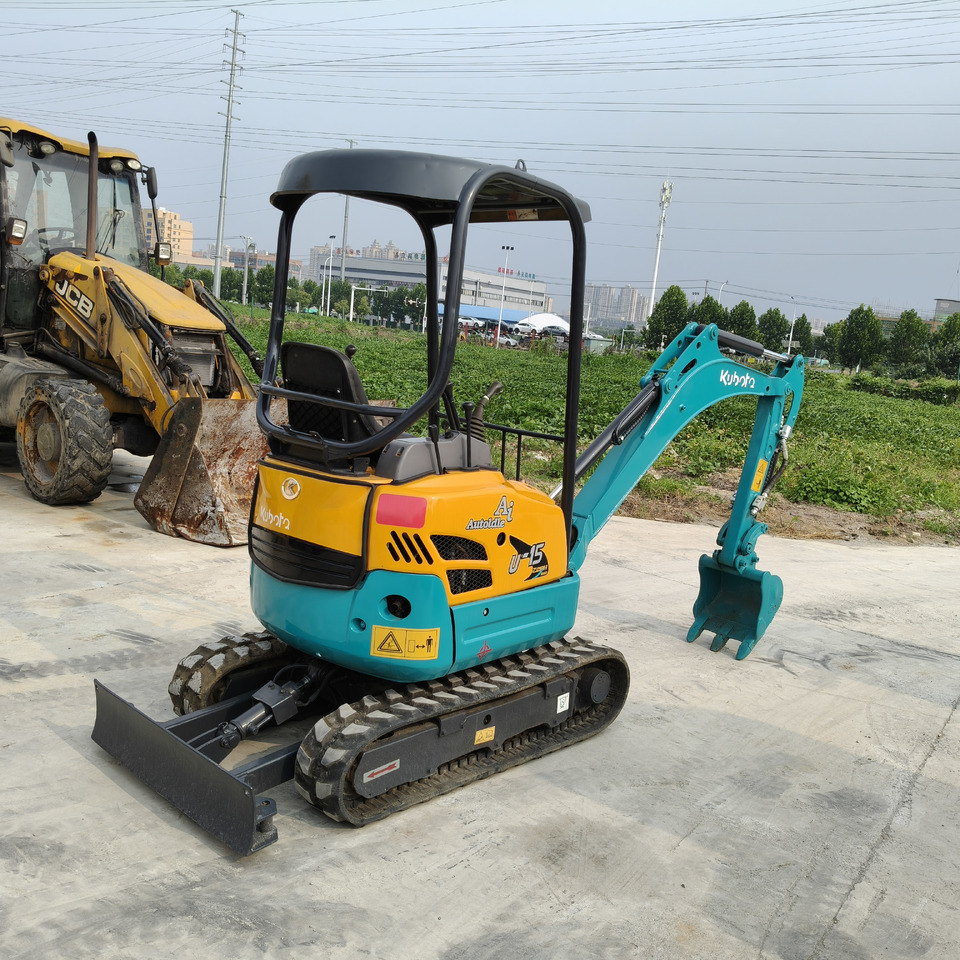 KUBOTA U15 - Mini bager: slika KUBOTA U15 - Mini bager KUBOTA U15 - Mini bager: slika KUBOTA U15 - Mini bager