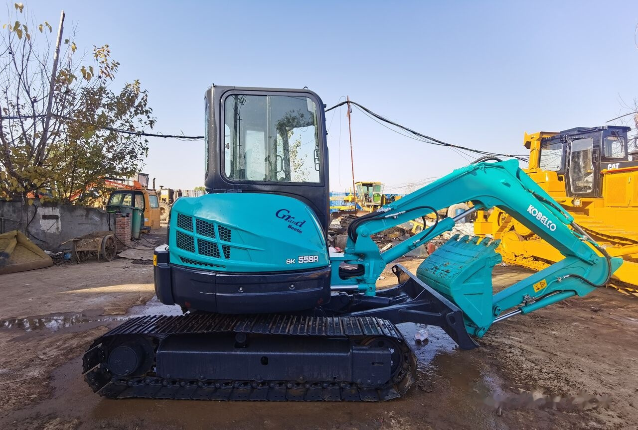 Kobelco SK55 - Mini bager: slika Kobelco SK55 - Mini bager Kobelco SK55 - Mini bager: slika Kobelco SK55 - Mini bager