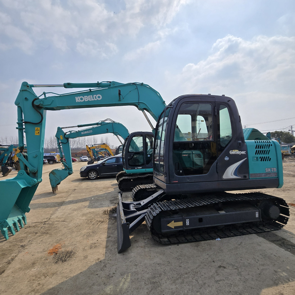 Kobelco SK75-8 - Mini bager: slika Kobelco SK75-8 - Mini bager Kobelco SK75-8 - Mini bager: slika Kobelco SK75-8 - Mini bager