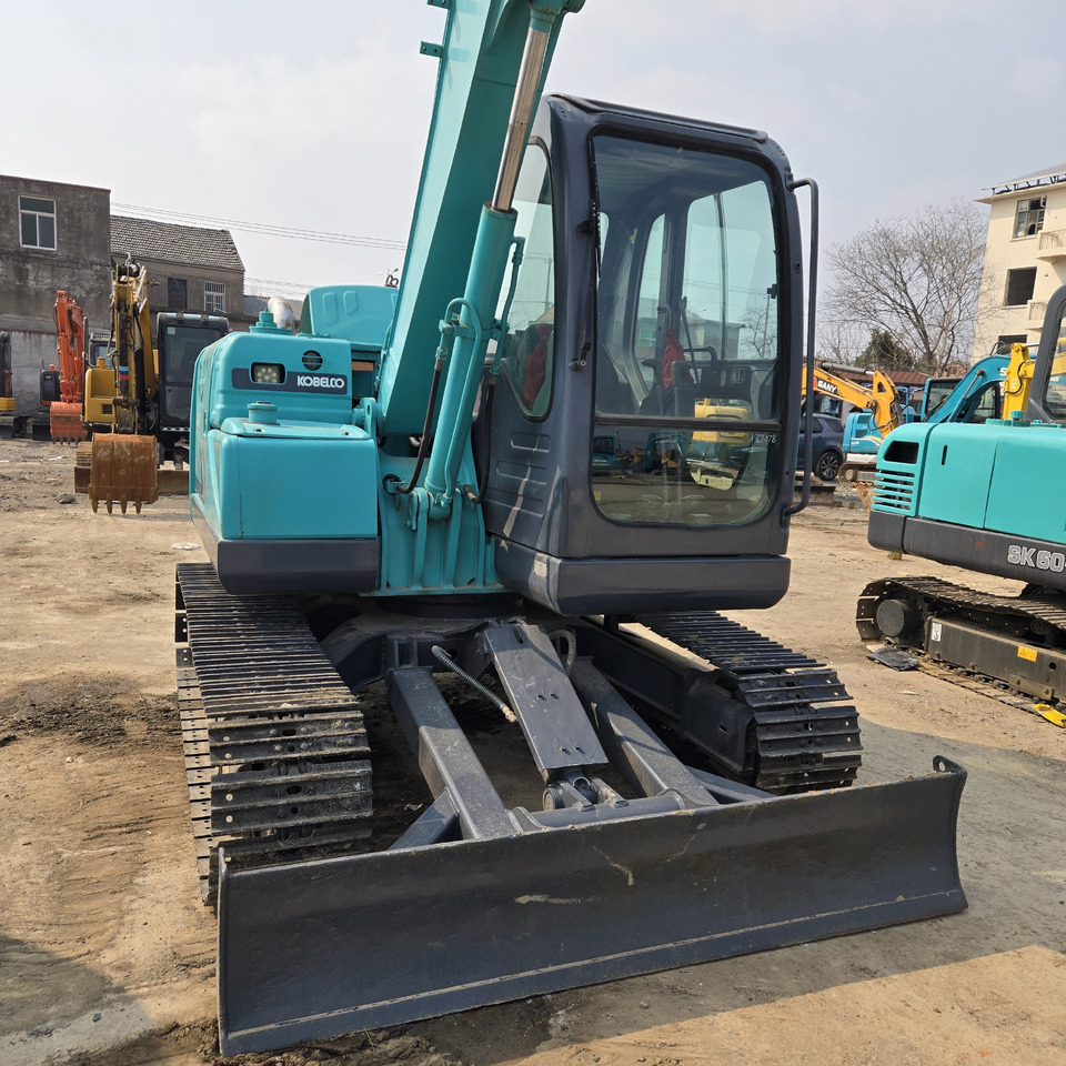 Kobelco SK75-8 - Mini bager: slika Kobelco SK75-8 - Mini bager Kobelco SK75-8 - Mini bager: slika Kobelco SK75-8 - Mini bager