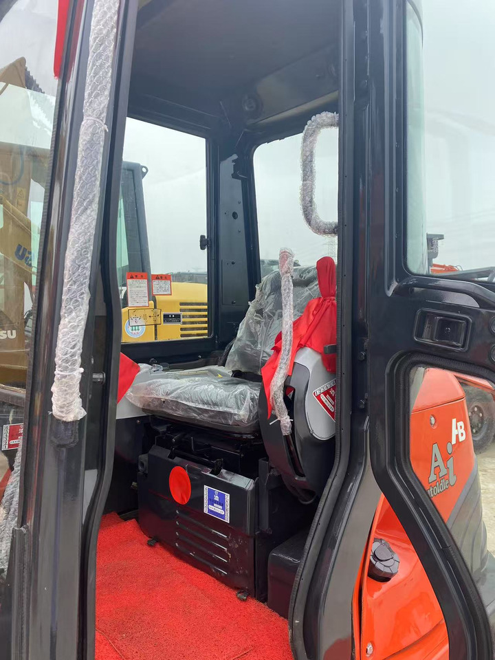 Kubota U55-4 - Mini bager: slika Kubota U55-4 - Mini bager Kubota U55-4 - Mini bager: slika Kubota U55-4 - Mini bager