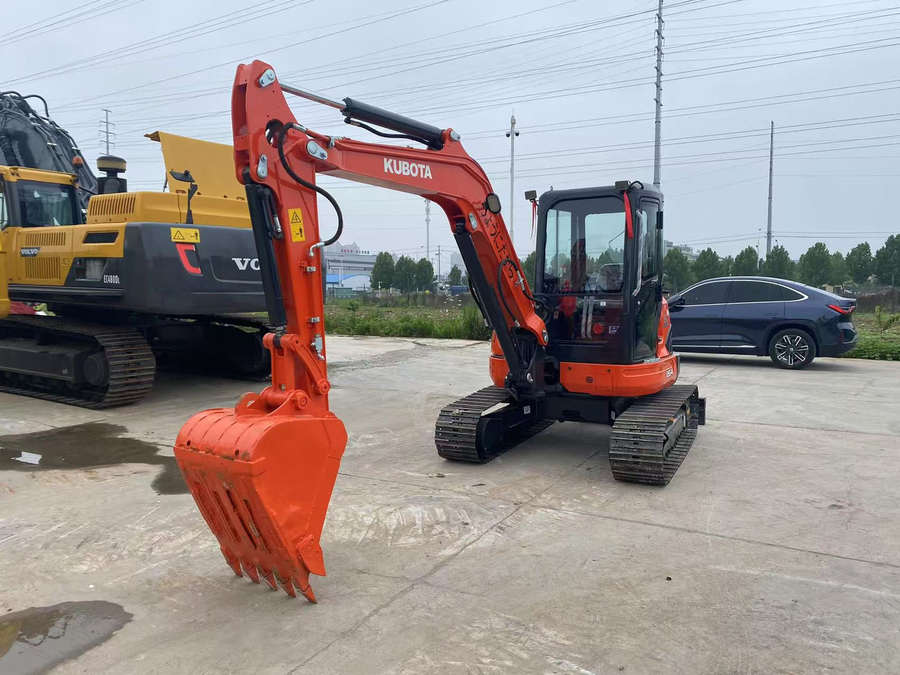 Kubota U55-4 - Mini bager: slika Kubota U55-4 - Mini bager Kubota U55-4 - Mini bager: slika Kubota U55-4 - Mini bager