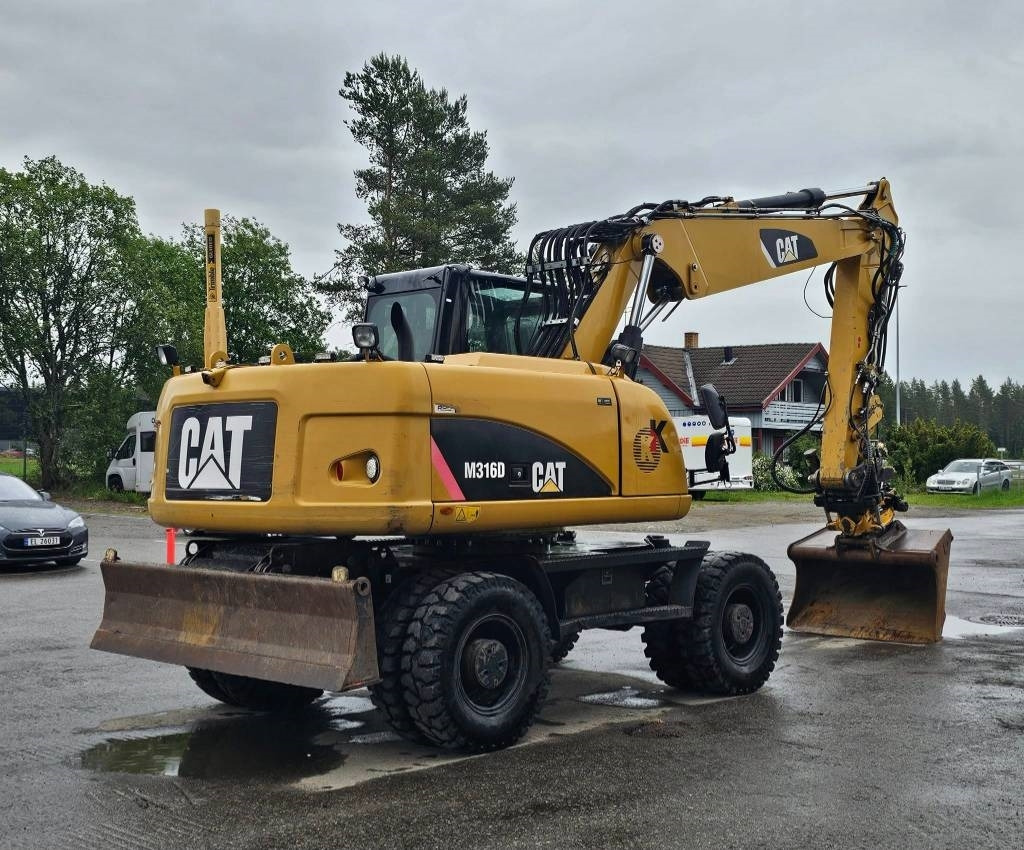 CAT M 316 D - Bager na kotačima: slika CAT M 316 D - Bager na kotačima CAT M 316 D - Bager na kotačima: slika CAT M 316 D - Bager na kotačima