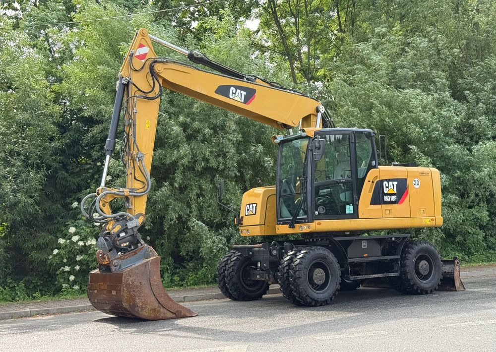 Caterpillar CAT 318 F * Powertilt * Sprowadzony* 9700 MTG * Caterpillar * Stan Perfekcyjny - Bager na kotačima: slika Caterpillar CAT 318 F * Powertilt * Sprowadzony* 9700 MTG * Caterpillar * Stan Perfekcyjny - Bager na kotačima Caterpillar CAT 318 F * Powertilt * Sprowadzony* 9700 MTG * Caterpillar * Stan Perfekcyjny - Bager na kotačima: slika Caterpillar CAT 318 F * Powertilt * Sprowadzony* 9700 MTG * Caterpillar * Stan Perfekcyjny - Bager na kotačima