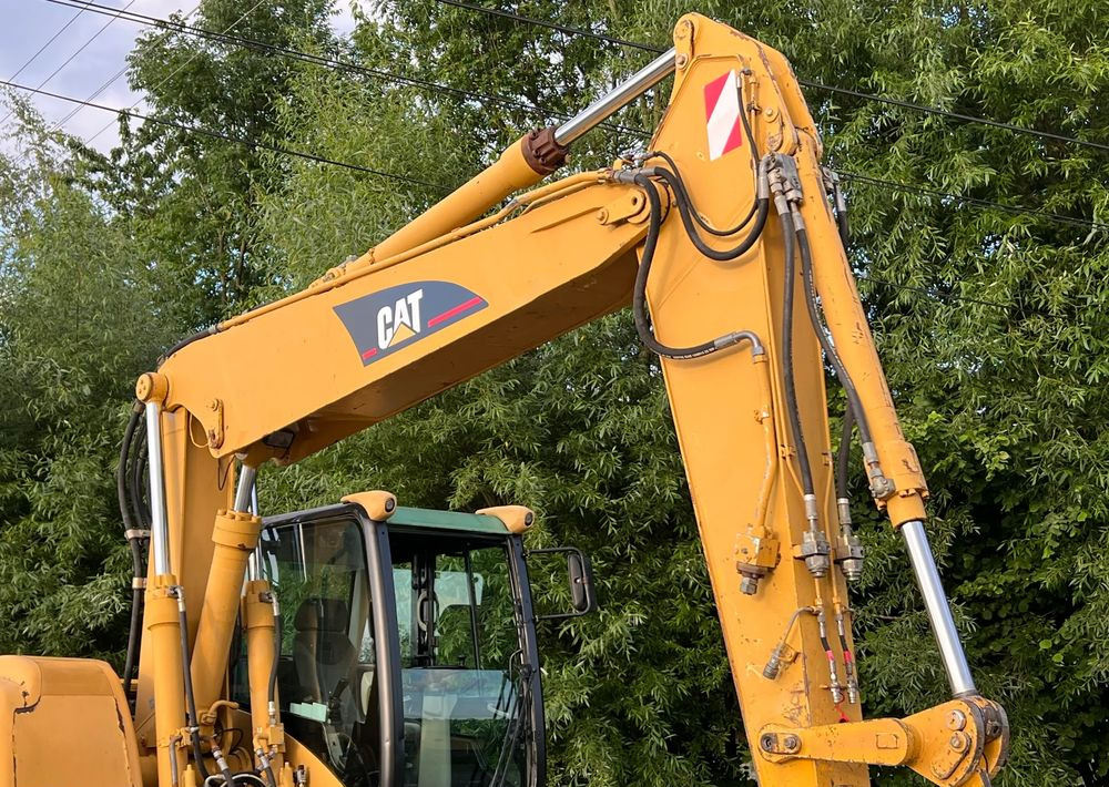 Caterpillar CAT M315C CATERPILLAR SPROWADZONY Bardzo Dobry Stan - Bager na kotačima: slika Caterpillar CAT M315C CATERPILLAR SPROWADZONY Bardzo Dobry Stan - Bager na kotačima Caterpillar CAT M315C CATERPILLAR SPROWADZONY Bardzo Dobry Stan - Bager na kotačima: slika Caterpillar CAT M315C CATERPILLAR SPROWADZONY Bardzo Dobry Stan - Bager na kotačima