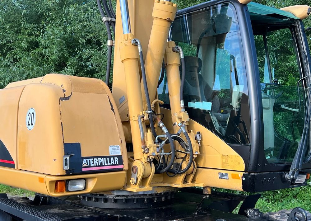 Caterpillar CAT M315C CATERPILLAR SPROWADZONY Bardzo Dobry Stan - Bager na kotačima: slika Caterpillar CAT M315C CATERPILLAR SPROWADZONY Bardzo Dobry Stan - Bager na kotačima Caterpillar CAT M315C CATERPILLAR SPROWADZONY Bardzo Dobry Stan - Bager na kotačima: slika Caterpillar CAT M315C CATERPILLAR SPROWADZONY Bardzo Dobry Stan - Bager na kotačima