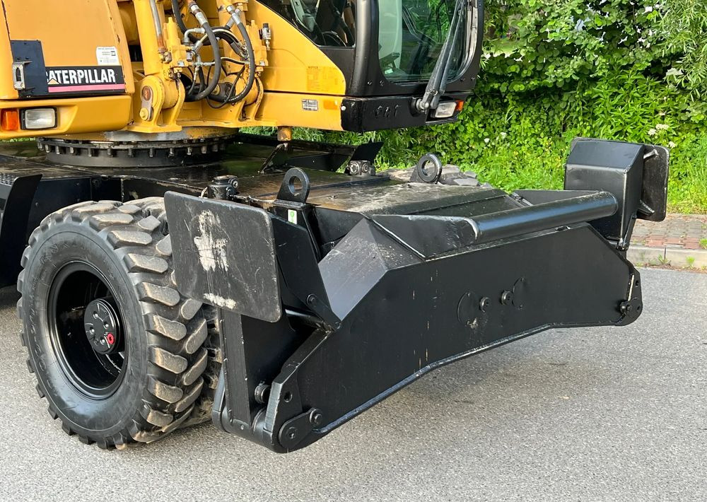 Caterpillar CAT M315C CATERPILLAR SPROWADZONY Bardzo Dobry Stan - Bager na kotačima: slika Caterpillar CAT M315C CATERPILLAR SPROWADZONY Bardzo Dobry Stan - Bager na kotačima Caterpillar CAT M315C CATERPILLAR SPROWADZONY Bardzo Dobry Stan - Bager na kotačima: slika Caterpillar CAT M315C CATERPILLAR SPROWADZONY Bardzo Dobry Stan - Bager na kotačima